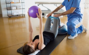 woman doing physical therapy exercises