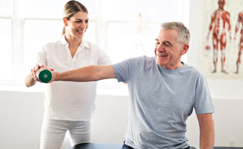 senior man doing physical therapy