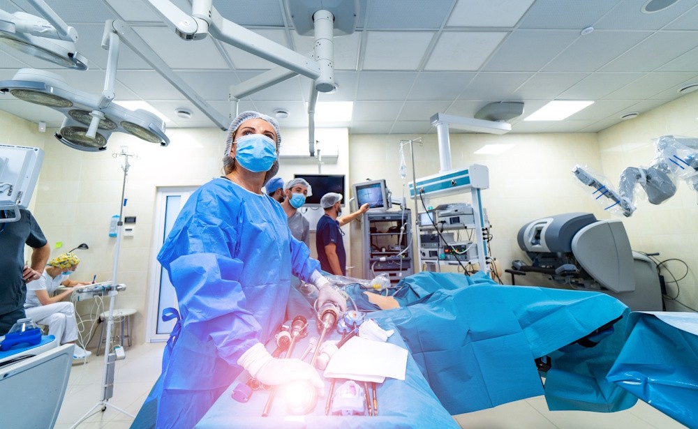 orthopedic surgeons using advanced technology during surgery