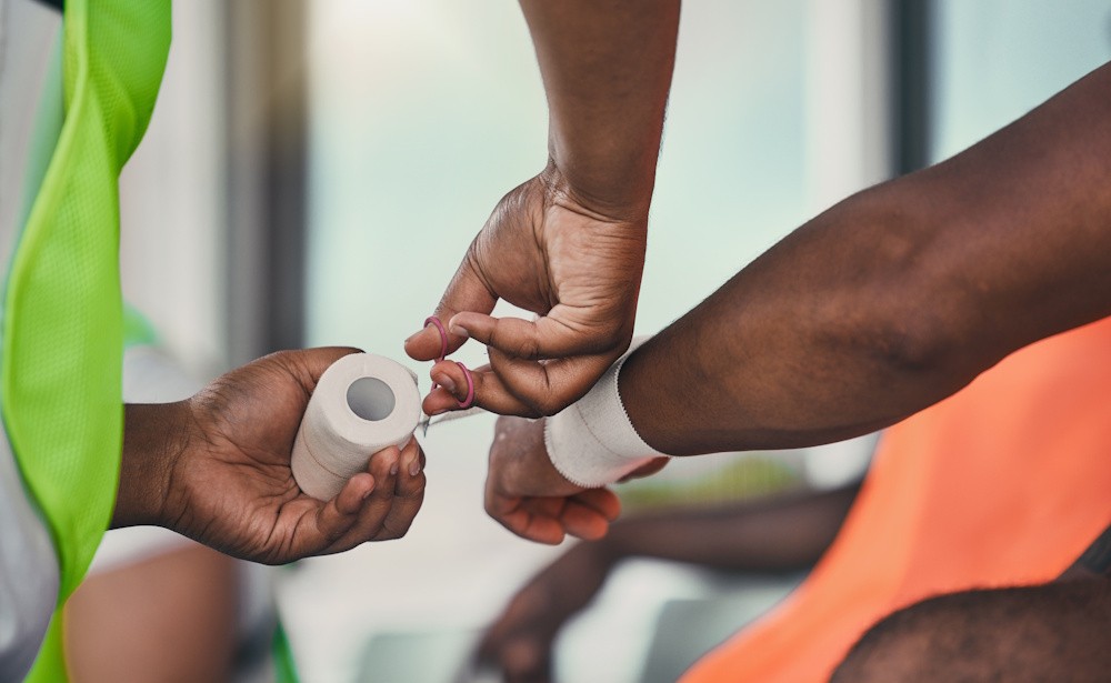 athletes wrist getting taped