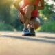 Woman runner got sports injury running on forest trail
